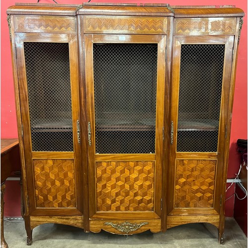 115 - A 19th Century French Louis XIV style mahogany and parquetry inlaid breakfront bibliotheque bookcase