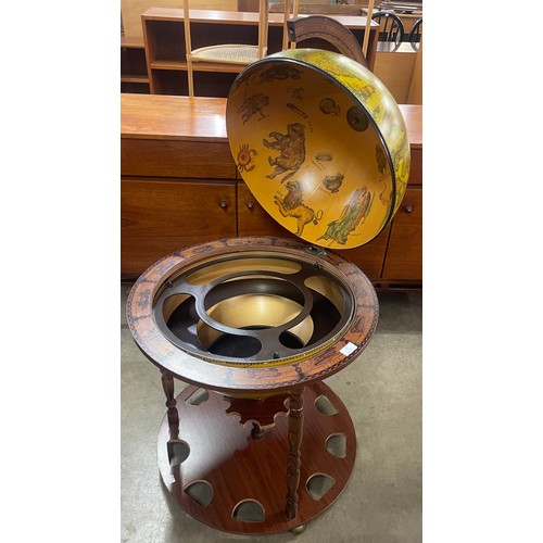 82 - An Italian style terrestrial globe cocktail cabinet/trolley