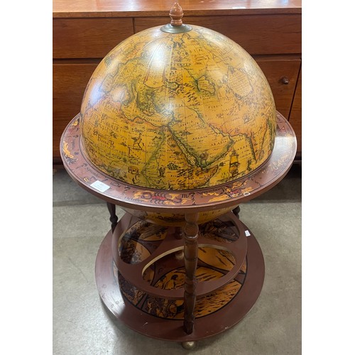 83 - An Italian style terrestrial globe cocktail cabinet/trolley