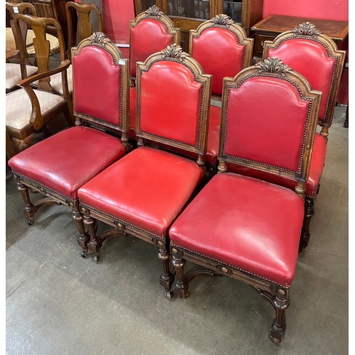 87 - A set of six Victorian carved oak and red leather dining chairs