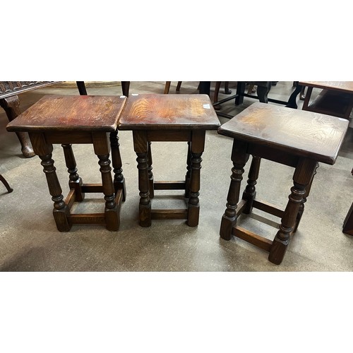 120 - A set of three 18th Century style oak stools