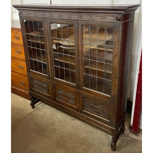 108 - An early 20th Century carved oak six door bookcase