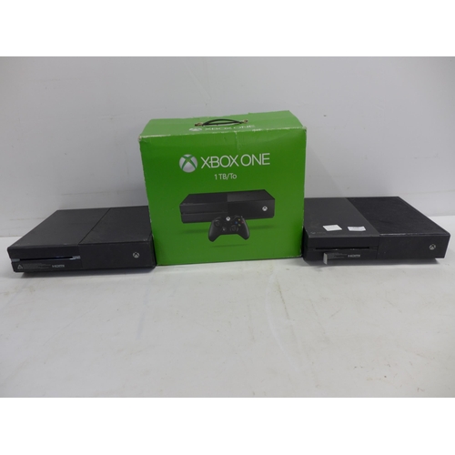 2105 - Two XBOX One consoles and an XBOX 360S console with three XBOX 360 wireless controllers, power suppl... 