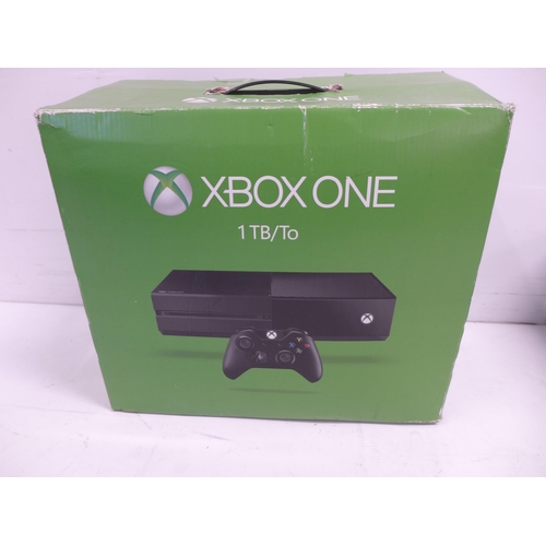 2105 - Two XBOX One consoles and an XBOX 360S console with three XBOX 360 wireless controllers, power suppl... 