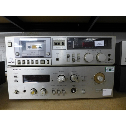 2123 - A Technics RS-M215 cassette recorder and a Technics SU-V4 stereo integrated DC amplifier