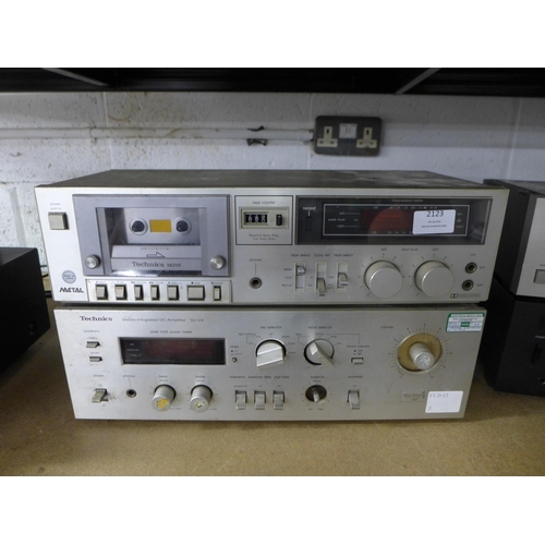 2123 - A Technics RS-M215 cassette recorder and a Technics SU-V4 stereo integrated DC amplifier