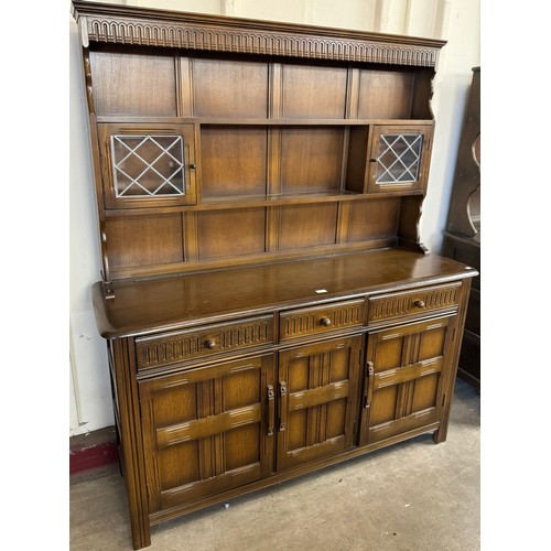 239 - A carved oak dresser