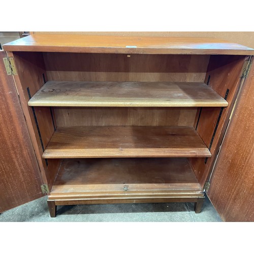 47 - A teak two door bookcase