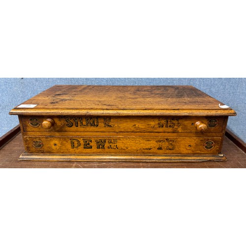 346 - An early 20th Century Dewhurst's Sylko oak counter top shop haberdashery cabinet