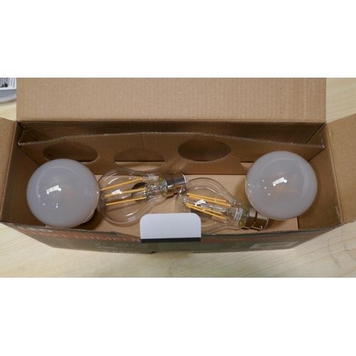 3143 - 2 packs Feit A60 100W Bulbs and an Led strip light  (325-395,396) This lot is subject to vat