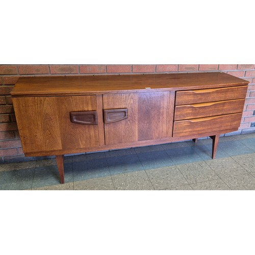 2 - A Beautility teak bowfront sideboard