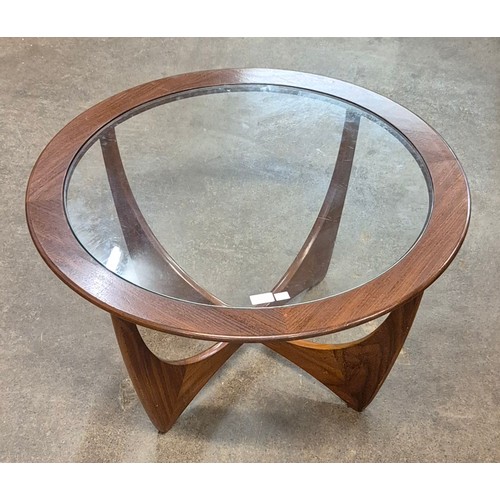 7 - A G-Plan Astro teak and glass topped circular coffee table