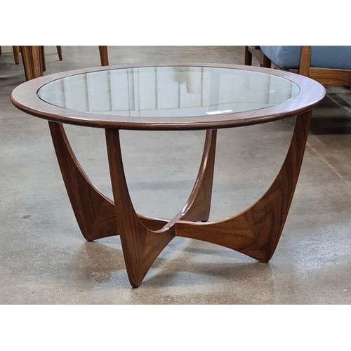 7 - A G-Plan Astro teak and glass topped circular coffee table