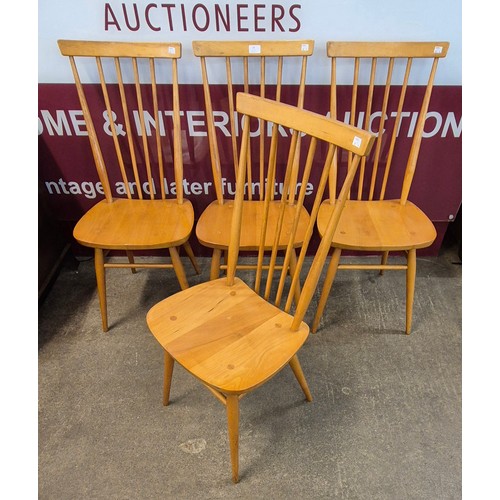 10 - A set of four Ercol Blonde elm and beech 608 model chairs