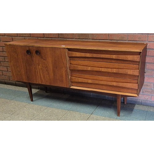 11 - A teak sideboard