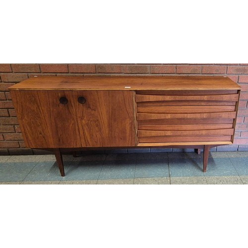 11 - A teak sideboard