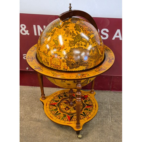 18 - An Italian terrestrial globe cocktail cabinet/trolley