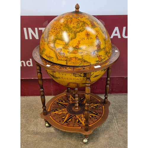 19 - An Italian terrestrial globe cocktail cabinet/trolley