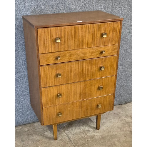 50 - A teak chest of drawers