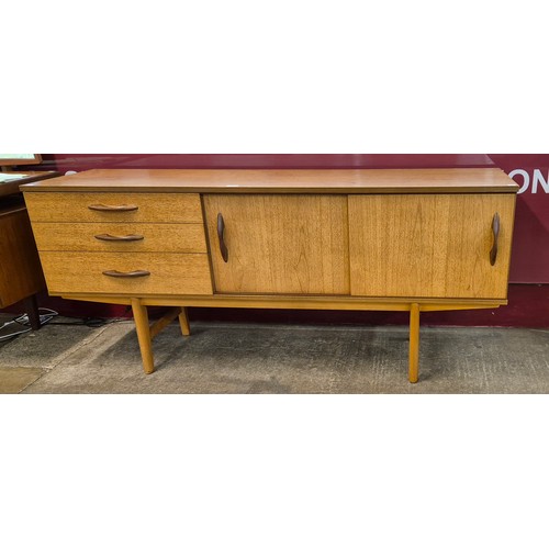 52 - An Avalon teak sideboard