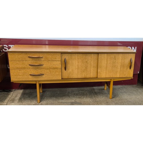 52 - An Avalon teak sideboard