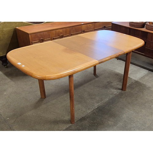 60 - A Danish teak extending dining table