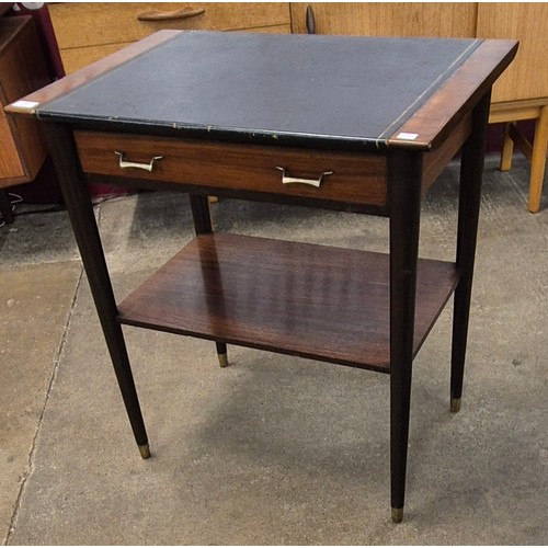 66 - A Beresford & Hicks tola wood and black leather topped writing table