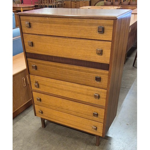 73 - A teak chest of drawers