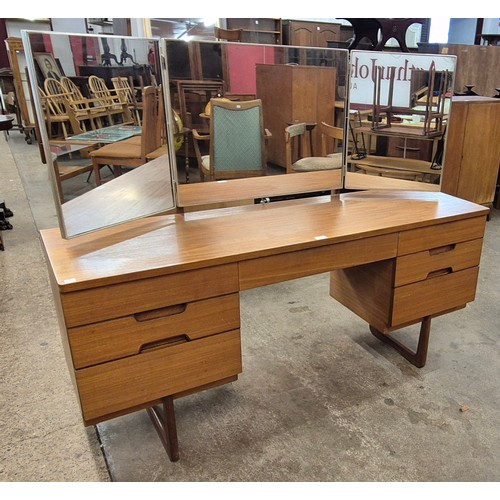 76 - A Uniflex teak dressing table