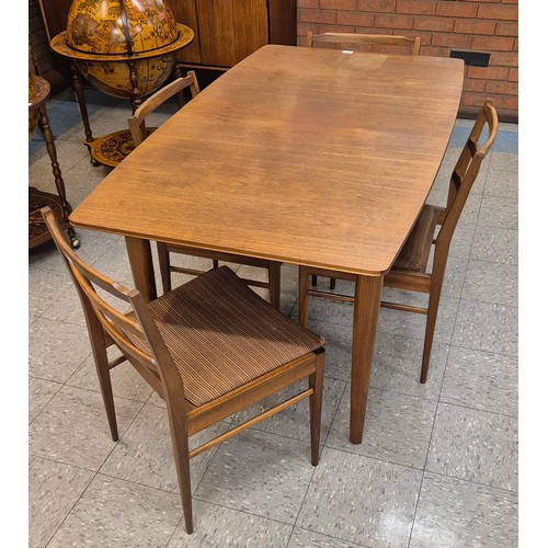 81 - A McIntosh Dunvegan teak extending dining table and four chairs