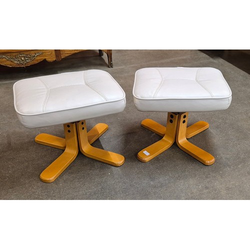 91 - A pair of beech and cream leather stools