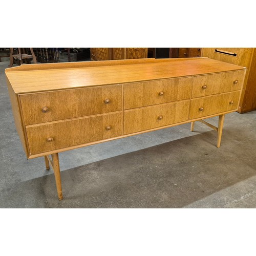 94 - A Heals of London oak sideboard