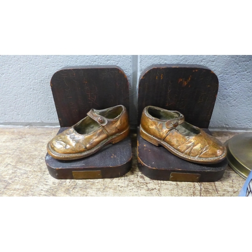 1162 - An Art Deco style biscuit barrel, a plated footed sweetmeat dish, a pair of bookends and an oil lamp... 