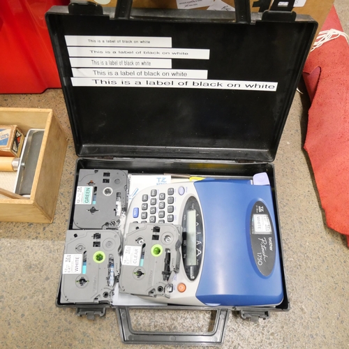 1164 - A green BT telephone, soldering iron and holder, a cased otoscope, a Brother P-Touch 750 label machi... 