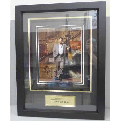 602 - George Clooney, signed photograph display, with authenticity