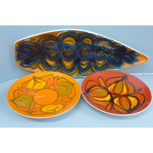 606 - Two Poole pottery Delphis plates, No. 3 and a Poole No. 82 dish, dish 43cm