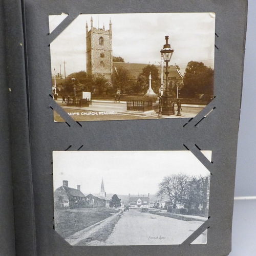 613 - A vintage postcard album containing 92 postcards