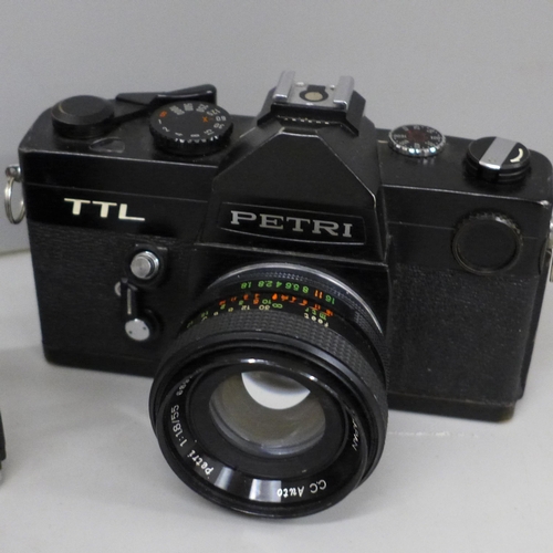 614 - Three vintage 35mm film cameras including an Edixa Prismat with Meyer Domiplan lens