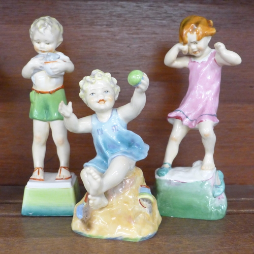 619 - A set of seven Royal Worcester porcelain Days of the Week figures, Tuesday and Friday a/f