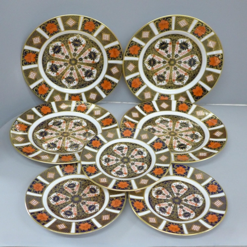 620 - Seven Royal Crown Derby Imari 1128 pattern plates, (4 and 3), two small plates second quality