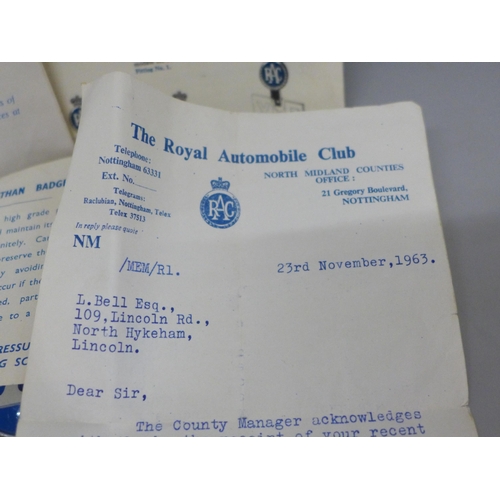 621 - A RAC badge with paperwork and box, and an AA badge