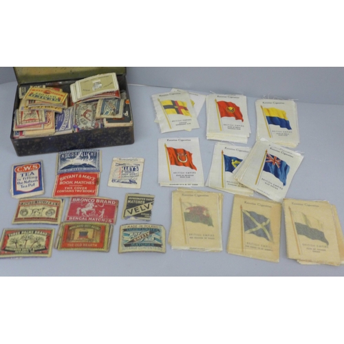 638 - Kensitas silks, Flags of the British Empire and National Flags and a tin of matchbox tops