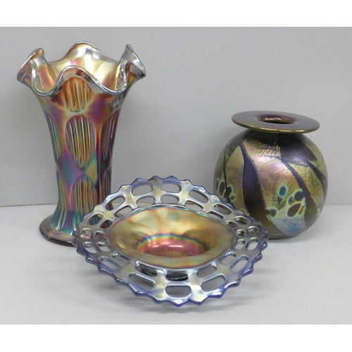 639 - An iridescent glass vase, blue carnival glass dish with pierced edge and a vase, tallest 17.5cm