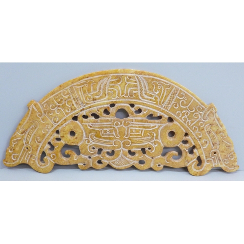 643 - A carved hardstone plaque, 30cm