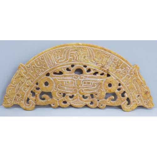 643 - A carved hardstone plaque, 30cm