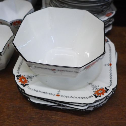 653 - A 1920s Shelley tea set, seven cups, one a/f, twelve saucers, eleven side plates, a bowl, a/f, and t... 