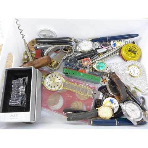 661 - A collection of assorted items including corkscrews, wristwatches, penknives, three pens with 14ct g... 