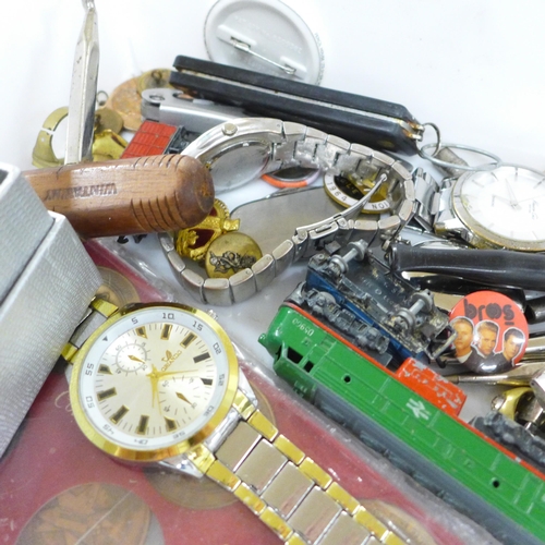 661 - A collection of assorted items including corkscrews, wristwatches, penknives, three pens with 14ct g... 