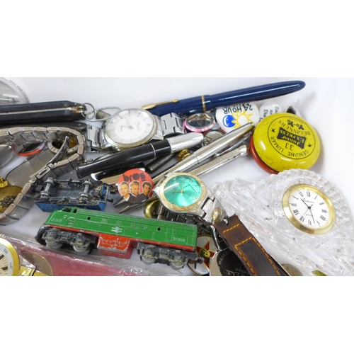 661 - A collection of assorted items including corkscrews, wristwatches, penknives, three pens with 14ct g... 