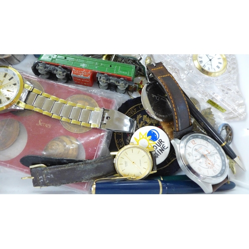 661 - A collection of assorted items including corkscrews, wristwatches, penknives, three pens with 14ct g... 